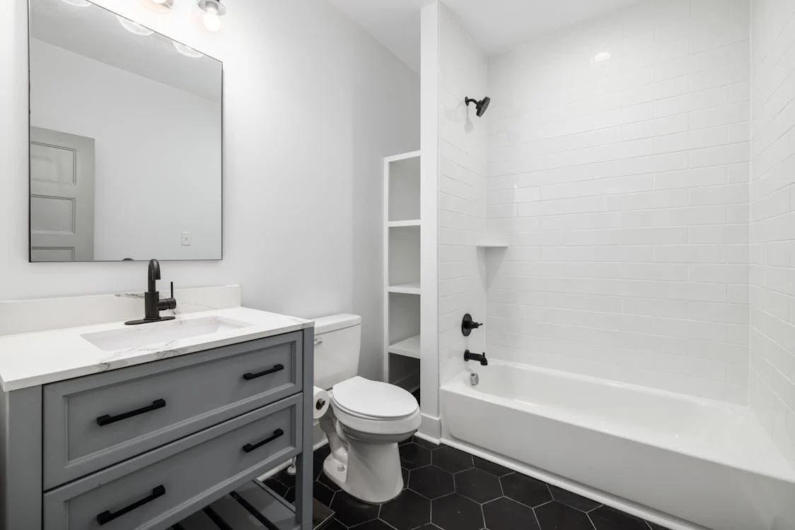 Refurbished hotel bathroom vanity with a modern design