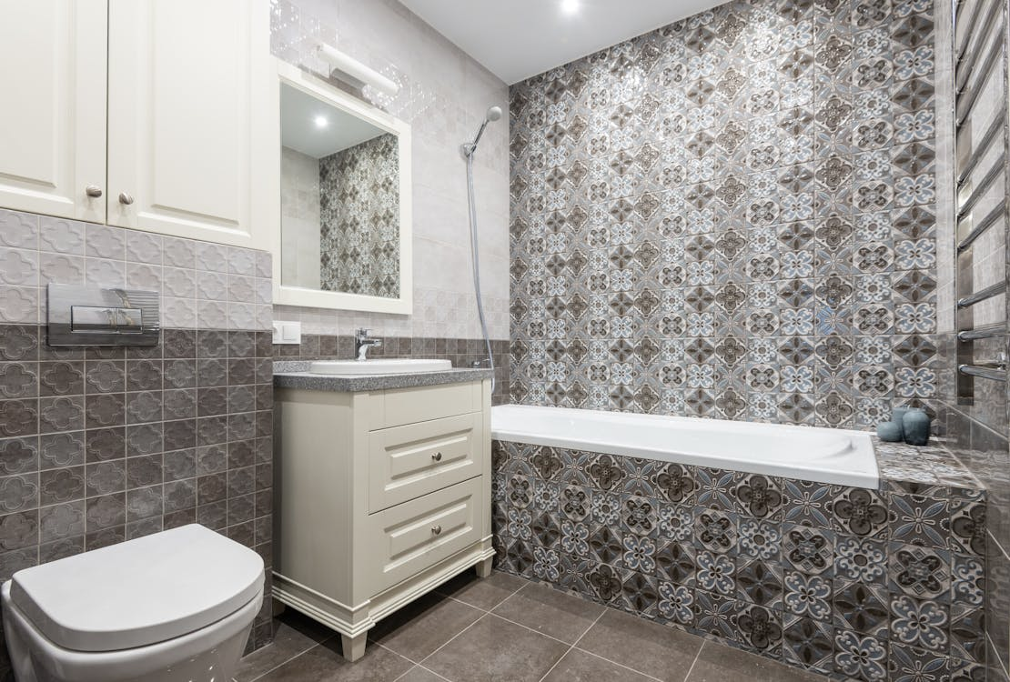 A hotel bathroom vanity that has undergone refinishing with minimal downtime