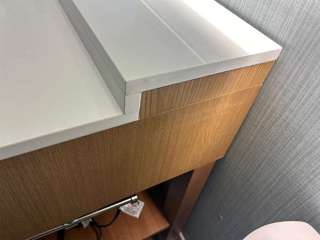 A restored bathroom vanity in a hotel