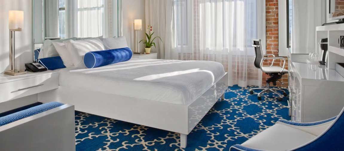 An image showcasing improved hotel bedroom furniture.